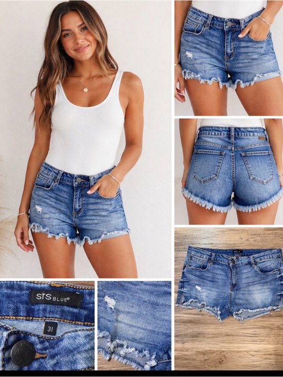 STS Blue Pants - STS Blue distressed denim shorts in a light wash with trendy frayed hem.Size 31.